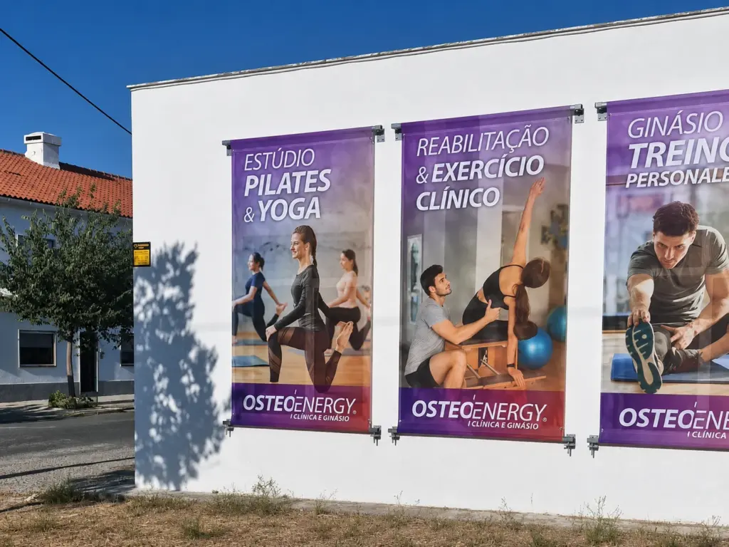 Fachada lateral do ginasio do Bacelo com as lonas da Osteoenergy